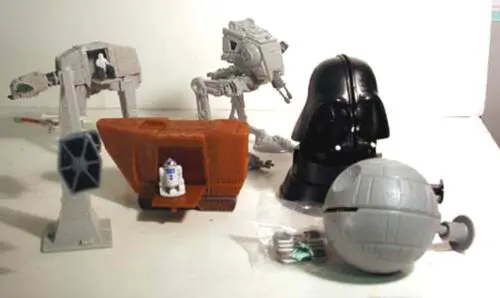 Star Wars toys including Darth Vader and AT-AT